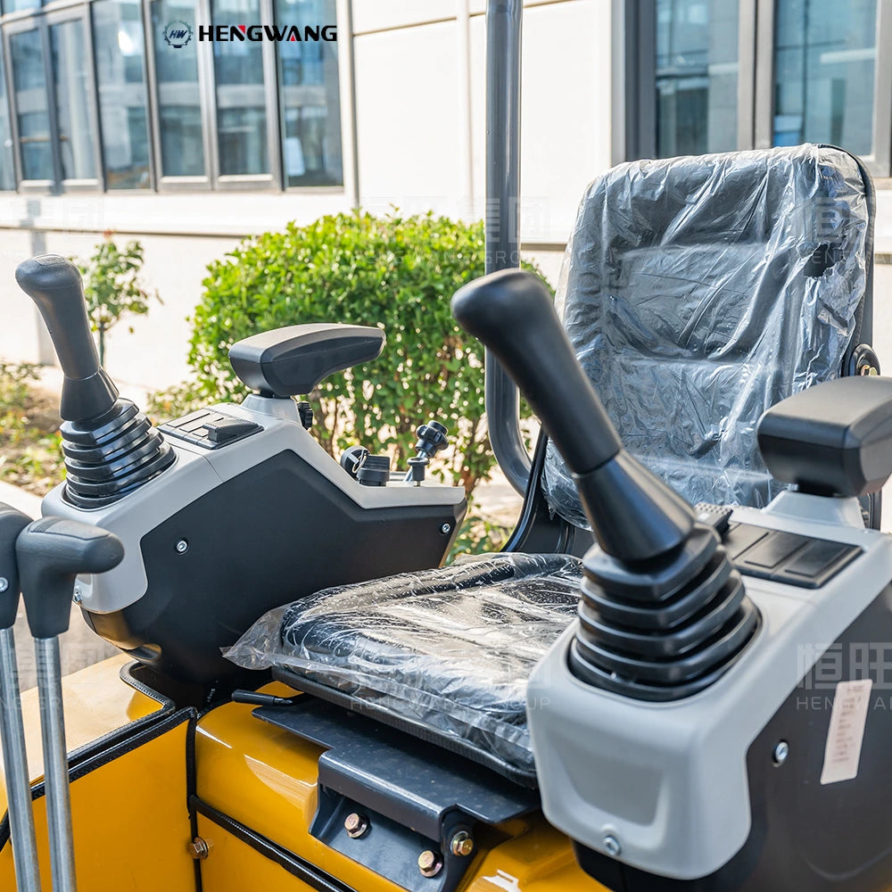 Ergonomic operator seat with dual pilot hydraulic control joysticks on Hengwang HW-13W 1.3 ton mini excavator