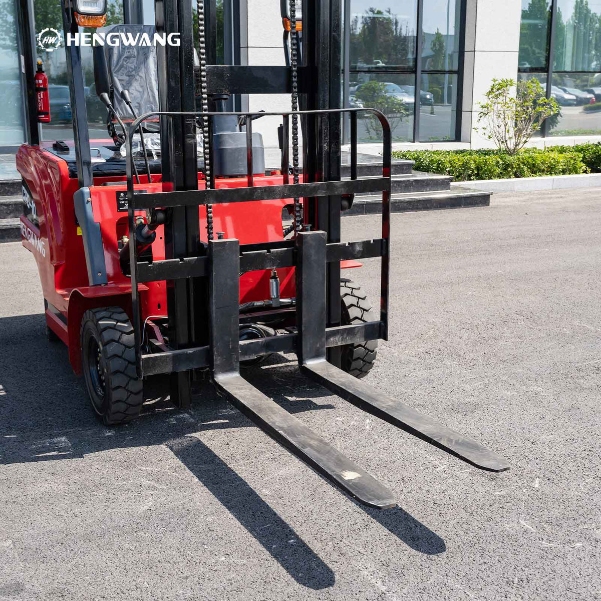 2,200 lb electric forklift with heavy duty forks and front mast
