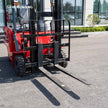 2,200 lb electric forklift with heavy duty forks and front mast