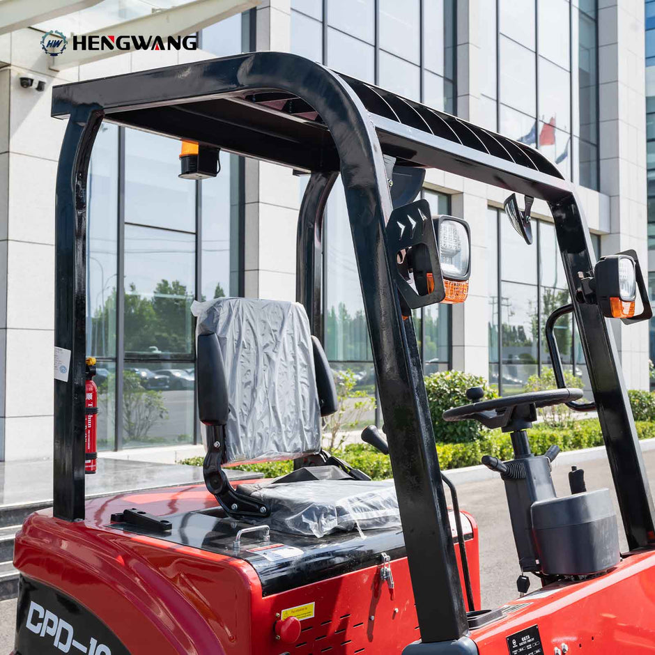 2,200 lb electric forklift with operator seat, overhead guard and controls