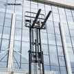 4400 lb electric forklift with raised forks and high lift mast