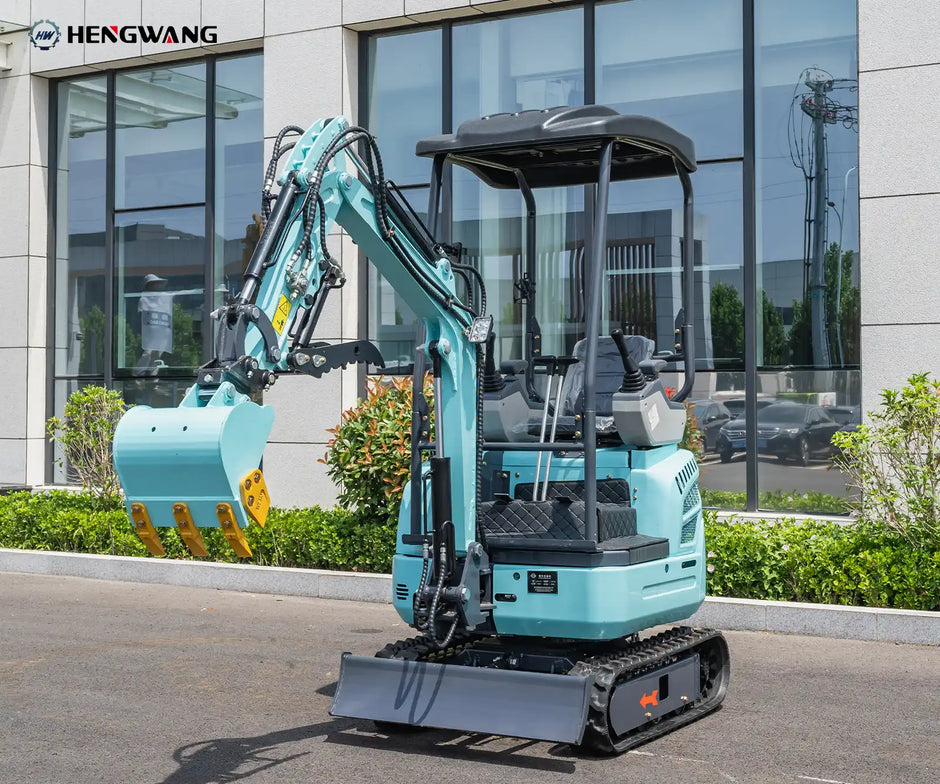 Compact mini excavator with digging bucket, rubber tracks and dozer blade