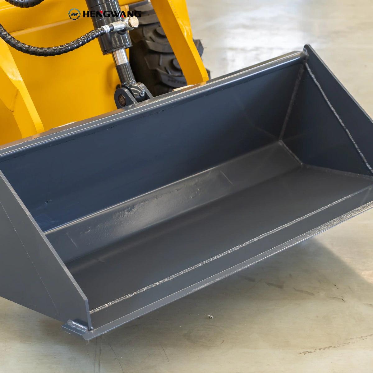 0.12m³ skid steer loader bucket with heavy-duty hydraulic lift arm for material handling on farms and construction jobsites
